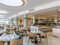 Restauracja w Sentido Neptun Beach z nakrytymi stołami