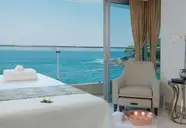 Jasny pokój z widokiem na morze w Sheraton Grand Rio