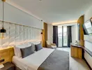 Nowoczesna sypialnia w hotelu Signature Blue Resort
