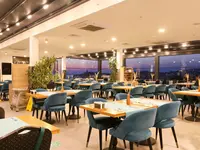 Restauracja w Signature Blue Resort  z widokiem na morze