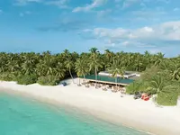 Plaża z białym piaskiem w Sirru Fen Fushi Private Lagoon Resort