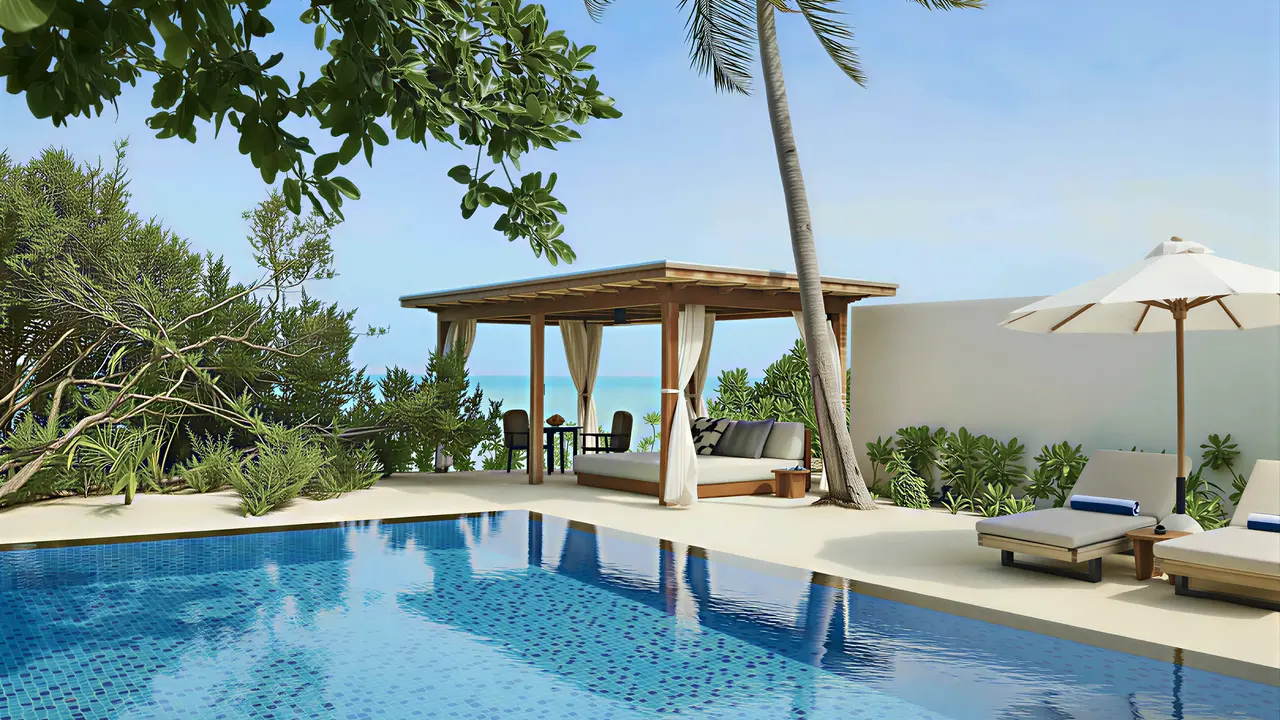 Basen i strefa wypoczynku w Sirru Fen Fushi Private Lagoon Resort