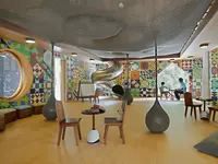 Kolorowy pokój dla dzieci w Sirru Fen Fushi Private Lagoon Resort ze zjeżdżalnią