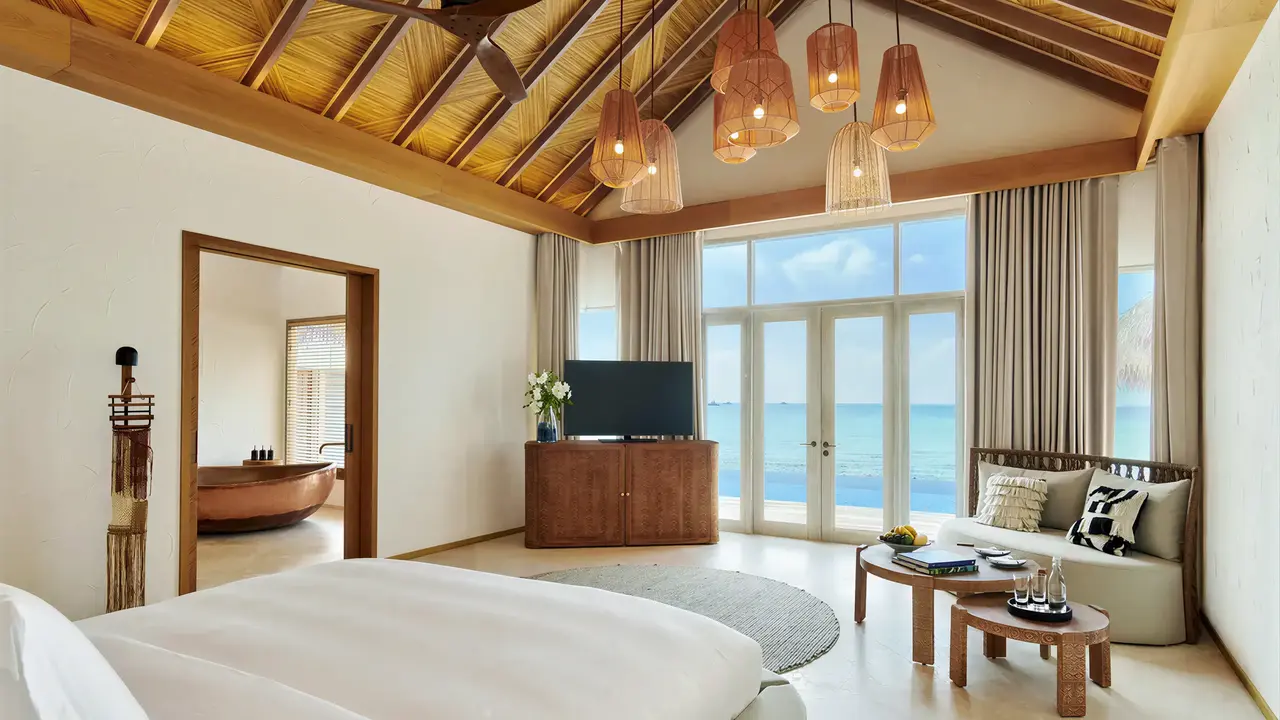 Wnętrze pokoju z widokiem w Sirru Fen Fushi Private Lagoon Resort