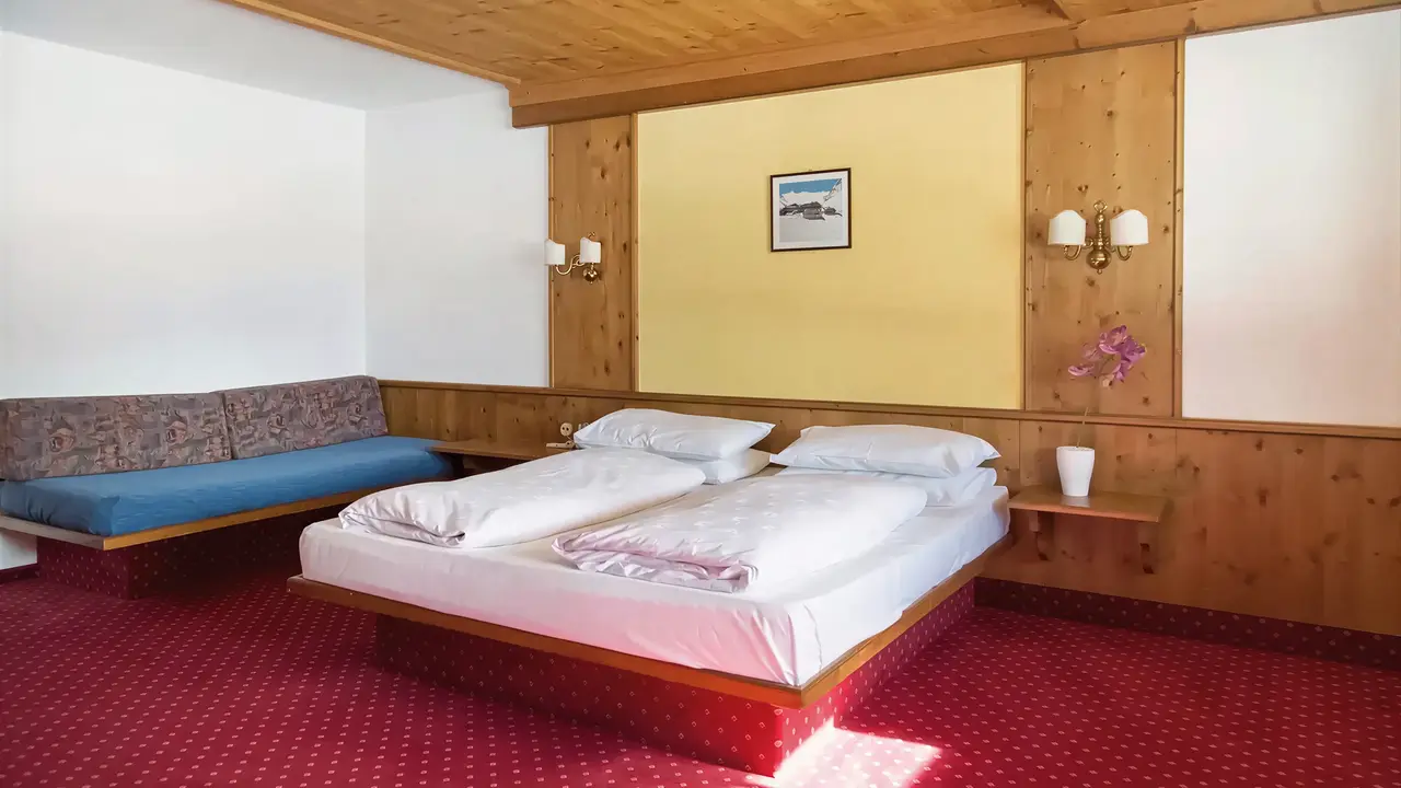 Pokój z łóżkami w Sporthotel Kurzras