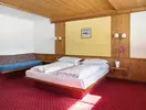 Pokój z łóżkami w Sporthotel Kurzras
