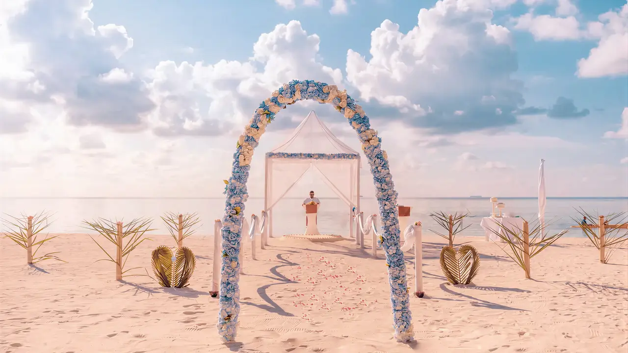 Łuk kwiatowy na plaży w Sun Siyam Olhuveli