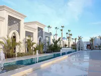 Elegancka fasada budynku w Sunrise Remal Beach z fontanną