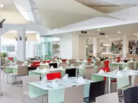 Restauracja w Tagoro Family & Fun z nakrytymi stołami