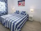 Sypialnia z łóżkiem w hotelu Tahiti Playa