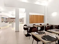  Restauracja w THB Felip z nakrytymi stołami