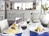 Posiłki na stole w restauracji ThePlace Mar Mediterrania