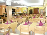 Restauracja w Ukino Terrace Algarve z nakrytymi stołami