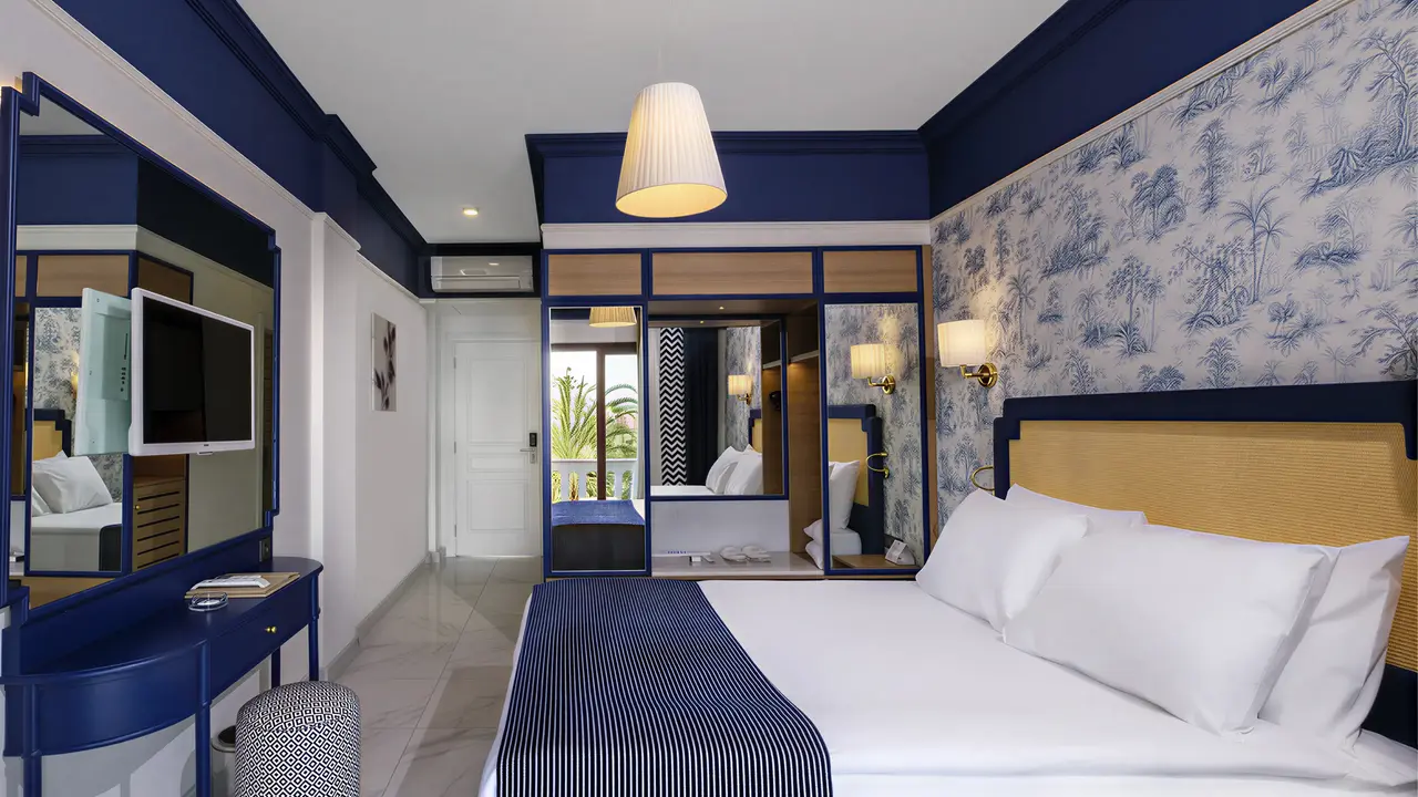 Sypialnia w hotelu Utopia Beach Club