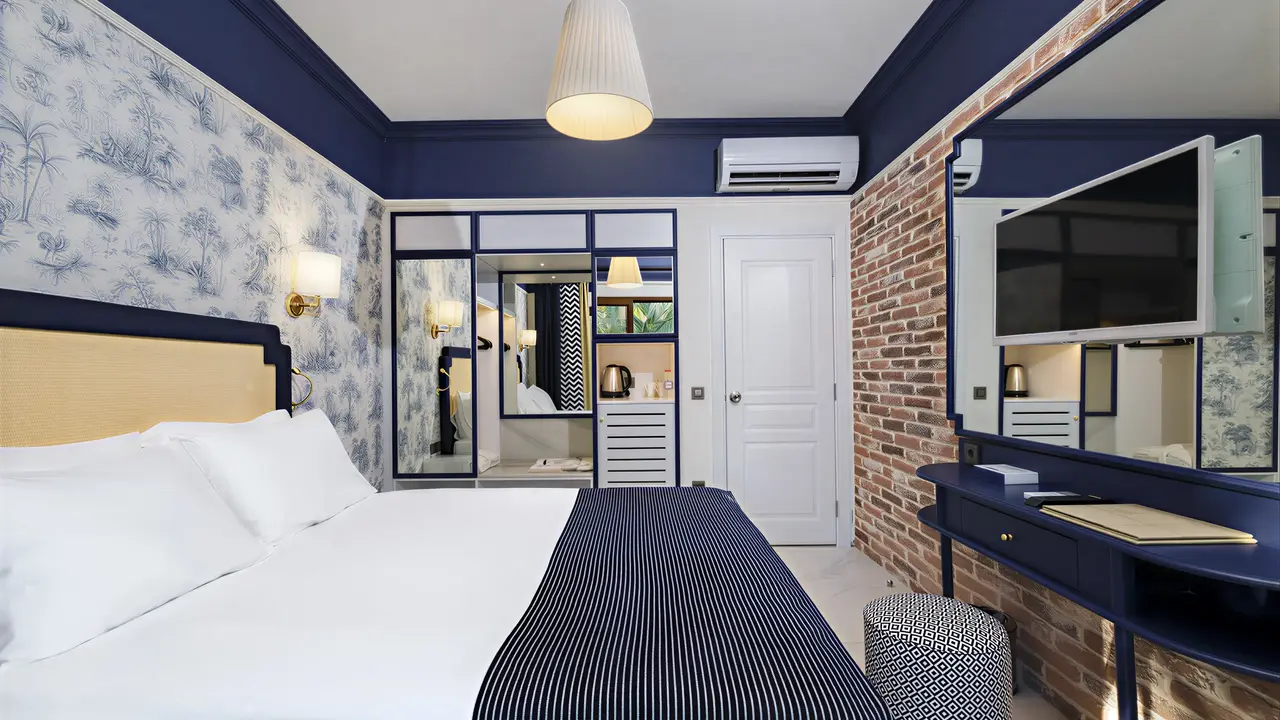 Przytulna sypialnia w hotelu Utopia Beach Club