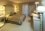 Wnętrze pokoju gościnnego w Utopia Resort and Spa