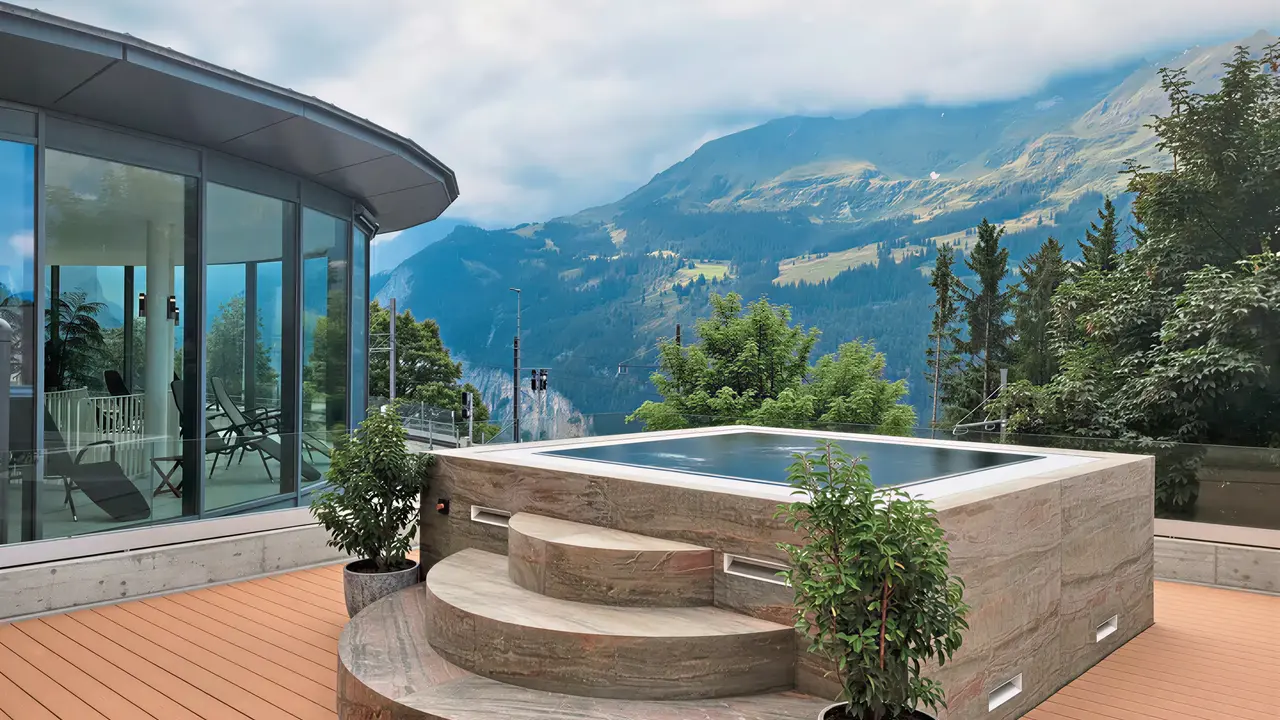 Prywatny jacuzzi na tarasie w Victoria Lauberhorn