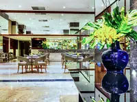 Elegancka restauracja w Windsor Oceanico z ustawionymi stolikami