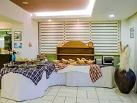 Bufet z jedzeniem w Xenios Anastasia Resort