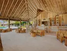 Bar z drewnianymi meblami w You & Me by Cocoon Maldives