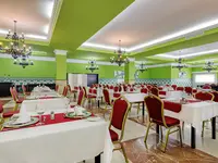 Restauracja w hotelu Zimbali Playa Spa z nakrytymi stołami