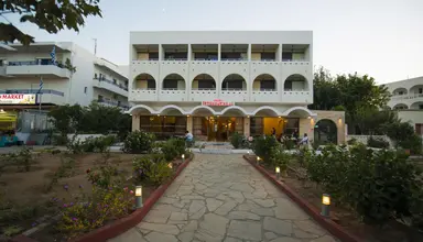 International (Kos)