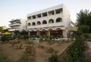 International (Kos)