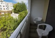 International (Kos)