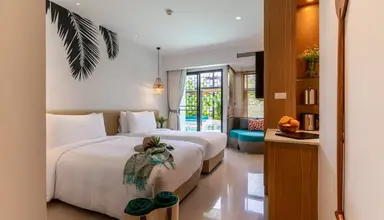 Outrigger Surin Beach Resort