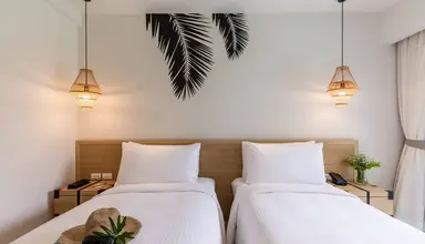 Outrigger Surin Beach Resort