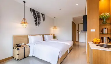 Outrigger Surin Beach Resort