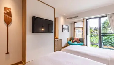 Outrigger Surin Beach Resort