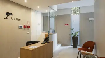 Apartamentos Monumental Plaza by Petit Hotels