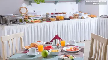 Astra Village Apartments & Suites