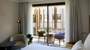 AULUS CHANIA, CURIO COLLECTION BY HILTON