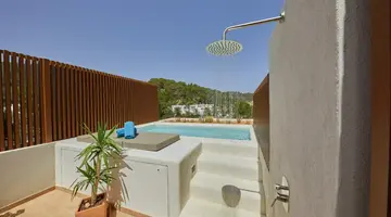 Cala San Miguel Resort The Club, Curio Collection by Hilton