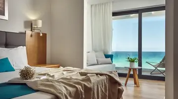 Cavo Orient Beach Hotel & Suites