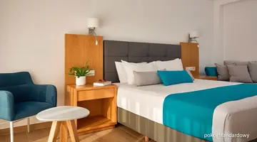 Cavo Orient Beach Hotel & Suites