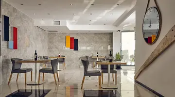 Cavo Orient Beach Hotel & Suites