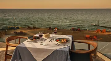 Cavo Orient Beach Hotel & Suites