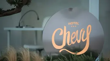 CHEVY HOTEL & SUITES