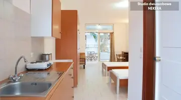 Coliseum Studios & Apartments