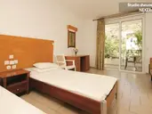 Coliseum Studios & Apartments