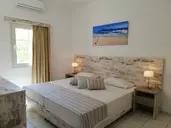 EVINA ROOMS & SUITES
