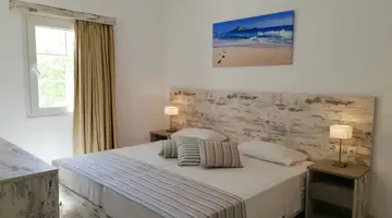 EVINA ROOMS & SUITES