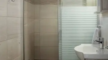 EVINA ROOMS & SUITES