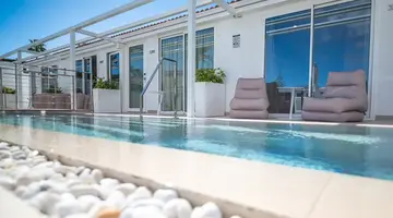 HL MIRAFLOR SUITES HOTEL