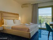 Hotel Ninos Grand Beach Resort