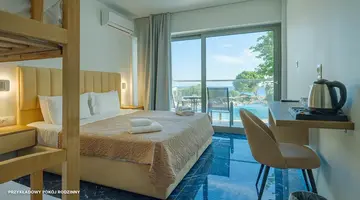 Hotel Ninos Grand Beach Resort