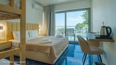 Hotel Ninos Grand Beach Resort